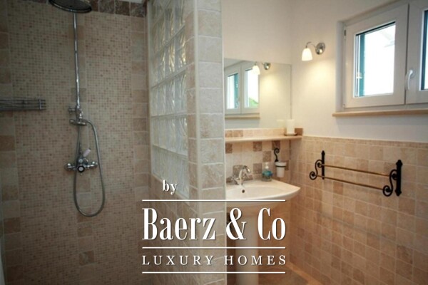 photo 13 Brač, Supetar, a house with a total area of 372 m² located on a plot of 411 m².