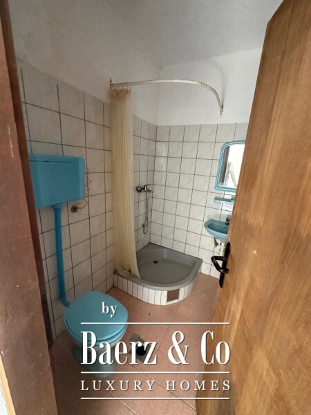 photo 12 House with a Plot in a Premium Location for Renovation